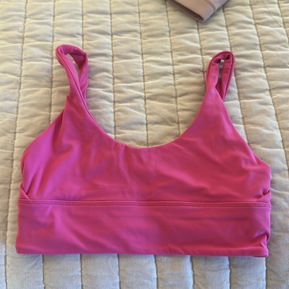 Pink Lululemon sports bra